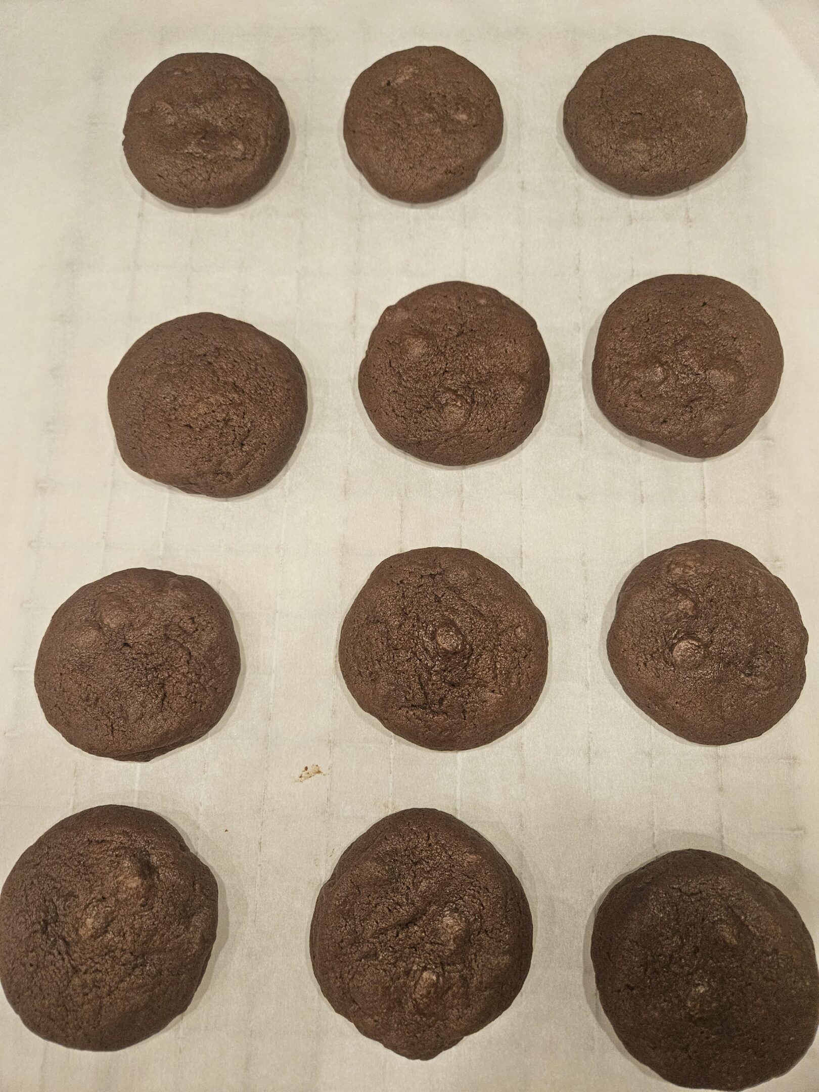Chocolate cookies on a baking sheet