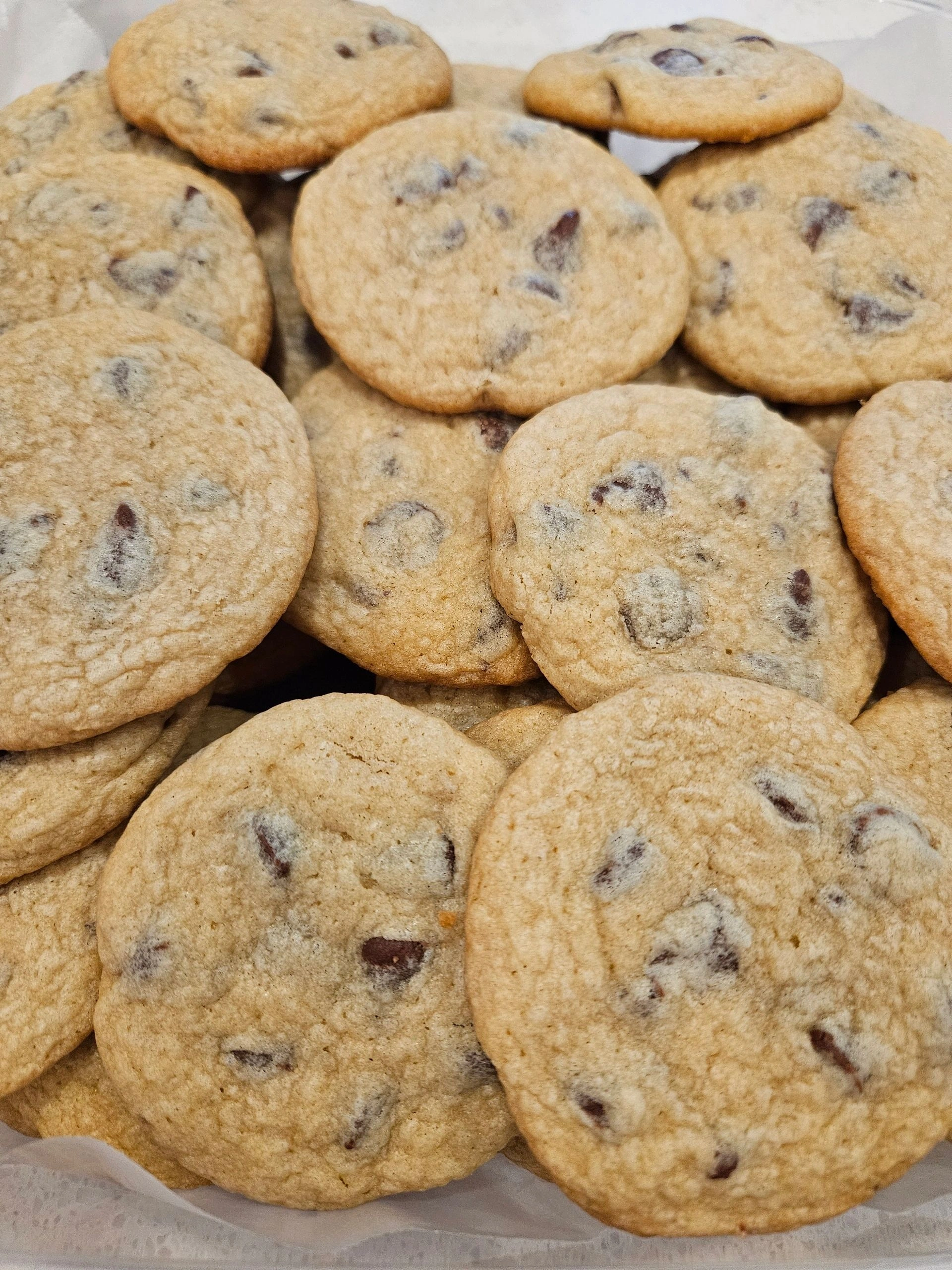 Chocolate chip cookies stacked together